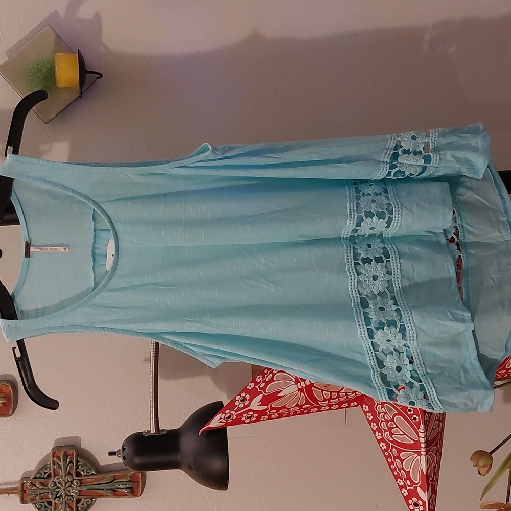 Light blue tank with flower crochet detail